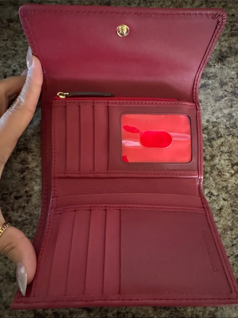 Dooney & Bourke Burgundy Leather wallet with Gold Logo